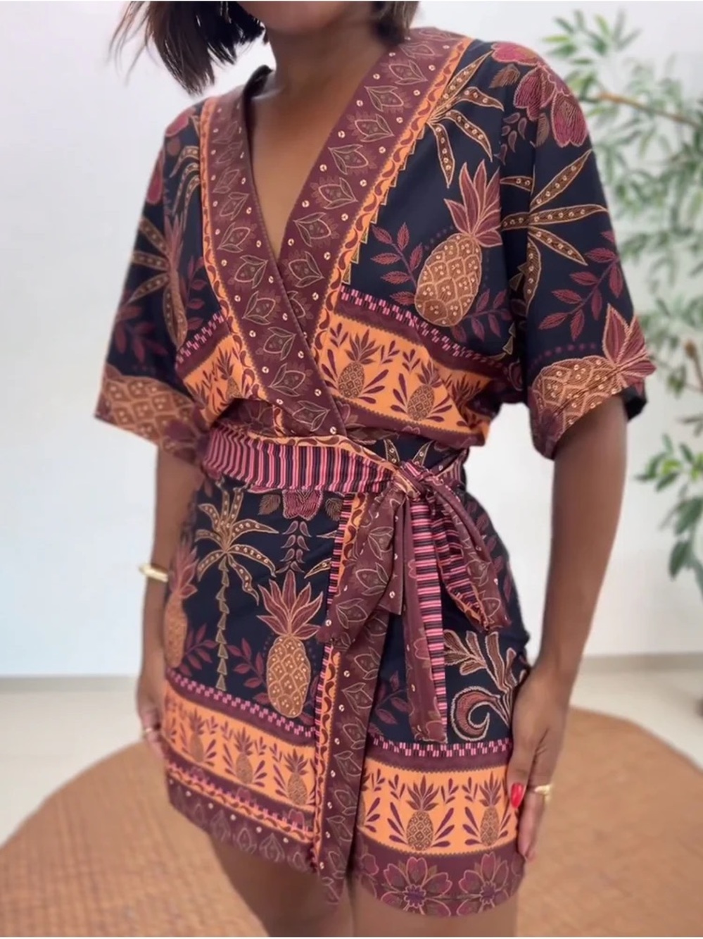 Floral Pineapple Wrap Romper in Black and Rust